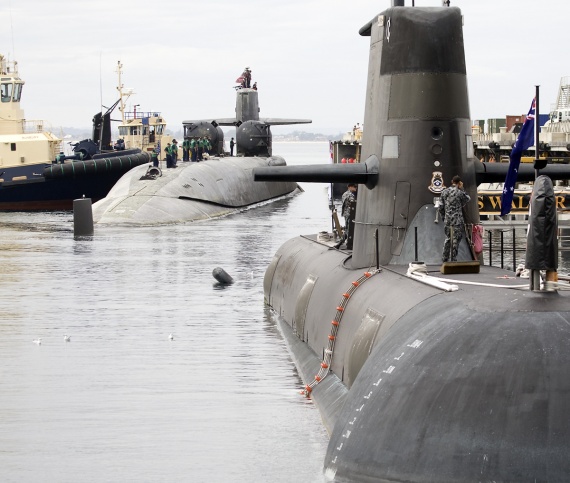 Ohio class cruise missile submarine (SSGN), USS Ohio, berths alongside Diamantine Pier, Fleet Base West with Collins Class submarine, HMAS Waller, in the foreground.