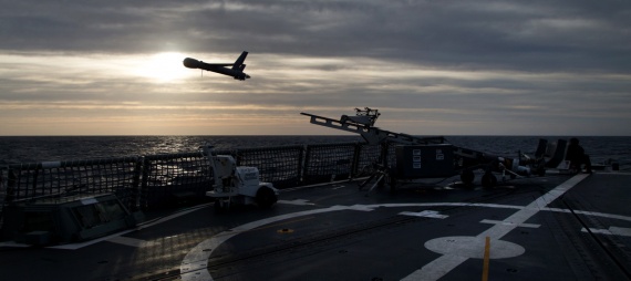 A ScanEagle unmmanned aerial vehicle launches from the flight deck of HMAS Newcastle during operational evaluation trials.