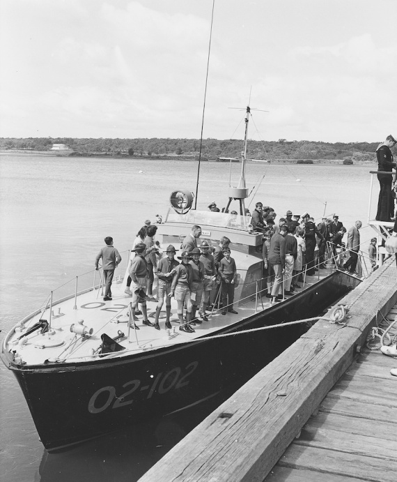 Air Spray alongside HMAS Cerberus, Westernport, Victoria disembarking boy scouts after a day at sea. Note that in this image she is wearing her RAAF pennant number 02-102