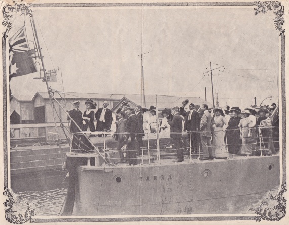 Hoisting the flags presented by Mayoress and Ladies of Richmond, Victoria, to the Commonwealth Destroyer Yarra.