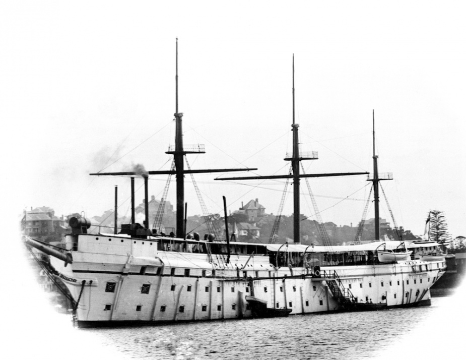 HMAS Tingira, her topmasts gone and in her new white livery as a training ship