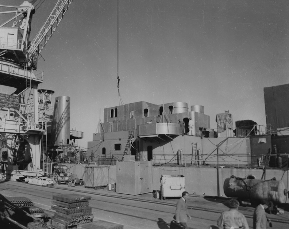 HMAS Vampire's funnel uptake structure being secured into position during her half life modernisation