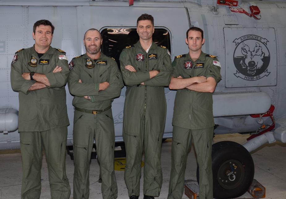 NUSQN 725 crewmembers LEUT Aaron Abbott, LCDR Michael Robertson, LEUT John Flynn and LEUT Warren Oates in Jacksonville after completing Naval Air Training and Operation Procedures Standardization checks in July 2013.