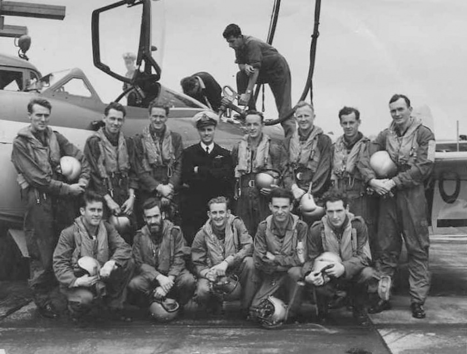 Lieutenant Stanley Carmichael with 808 Squadron in 1955. Carmichael and Acting Sub-lieutenant Michael Williams were killed when their 724 Squadron Sea Venom crashed into the sea off the NSW South Coast in 1959. Carmichael is second from the left in the front row, with the beard.