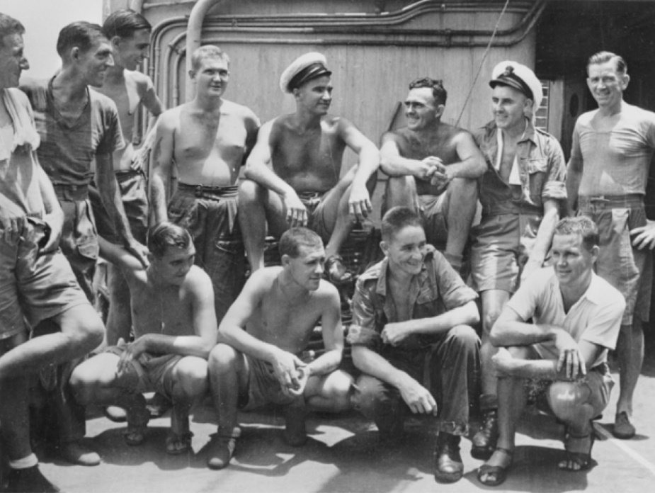 Survivors of HMAS Perth arrive at Darwin on HMT Highland Chieftain. Pictured, left to right: Petty Officer (PO) Ernest Robinson of Sydney, NSW; Chief Petty Officer (CPO) Joseph Hughes of Sydney, NSW; Able Seaman (AB) Edmund Clark of WA; Stoker Alan Axton of Vic; PO Charles Thomson of WA; CPO Wilfred Barnes of Sydney, NSW; PO Edward Tyrrell of Vic; CPO Robert Bland of Sydney, NSW; AB Cyril Woodman of SA; AB Eric Hurst of WA; Stoker Clive Henry of VIC, and Stoker Herbert Mynard of Vic.