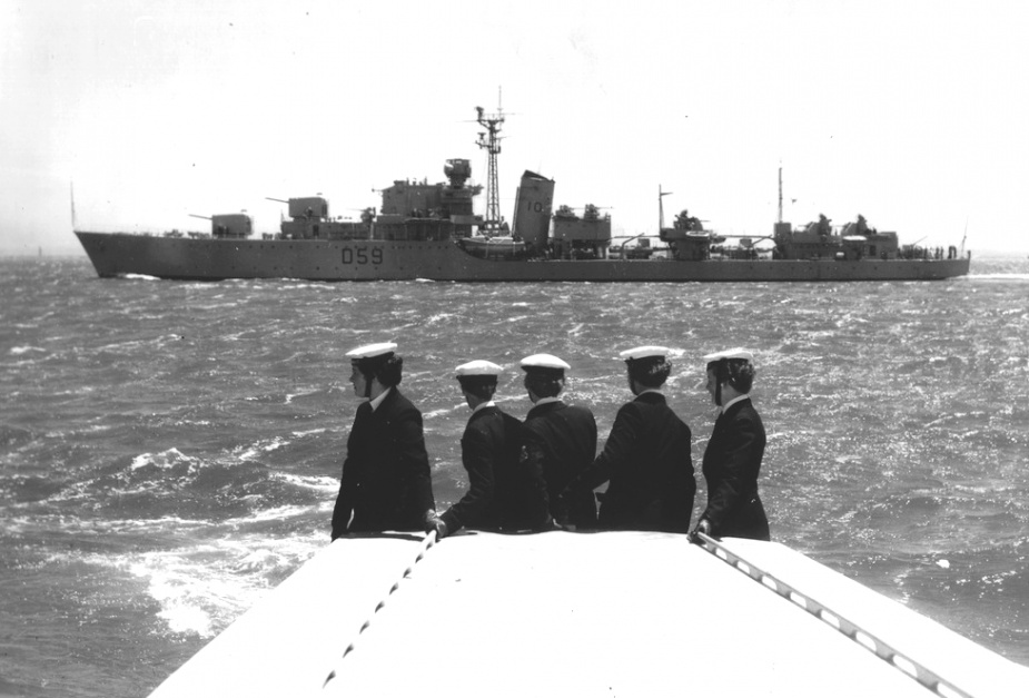 Members of the Women's Royal Australian Naval Service farewell HMAS Anzac as she leaves Sydney Harbour