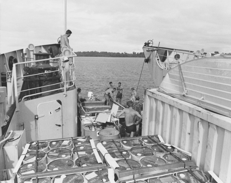 HMAS Brunei disembarking explosives for channel clearing operations in the Solomon Islands.