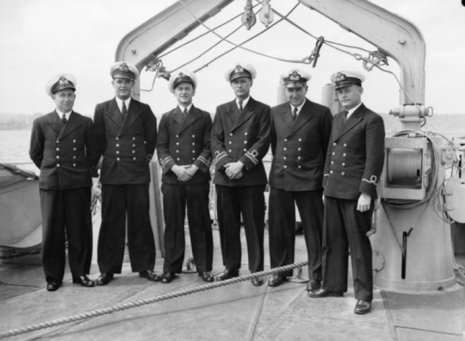 Officers of Bundaberg's wardroom pose for a formal photograph onboard.