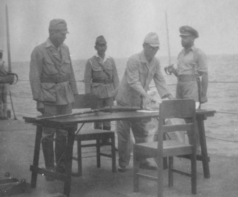 Vice Admiral Kamada following the surrender of his sword to General Milford. (RC Higgins collection)