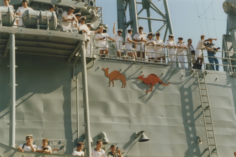 In a departure from normal convention the crew of HMAS Canberra (II) temporarily added the silhouette of a camel to the ship's superstructure to denote her return from service in the Middle East.