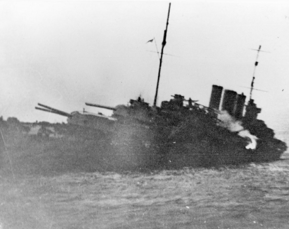The stricken HMAS Canberra (I) following the action at Savo Island. After being struck by at least two Japanese torpedoes and numerous enemy salvos, she was deemed unsalvageable and consequently evacuated and sunk off Savo Island on 9 August 1942. This stretch of water is now known as Iron Bottom Sound after 32 Allied ships were sunk there during WWII.