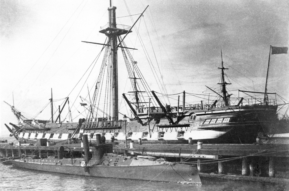 Childers alongside at Williamstown. Note HMVS Nelson in the background.