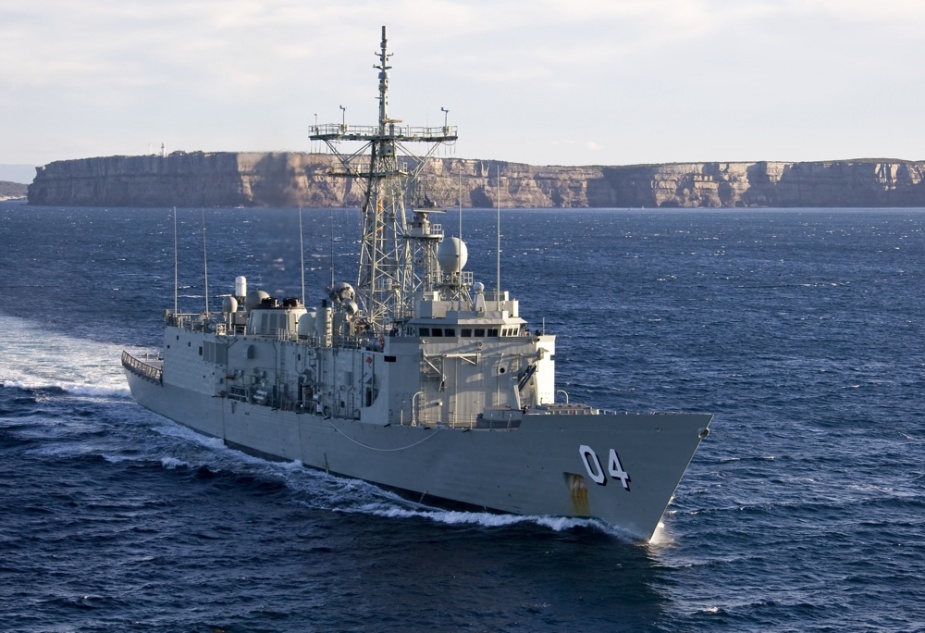 HMAS Darwin FFG 04 (Commanding Officer, Commander Craig Powell, RAN) sails out from Jervis Bay, NSW, passing Point Perpendicular, as the ship heads for sea in the Eastern Australian Exercise Area (EAXA) to conduct FFG Upgrade Contractor Trials after being recently fitted with the new VLS (Vertical Launch System), 12 June 2008.