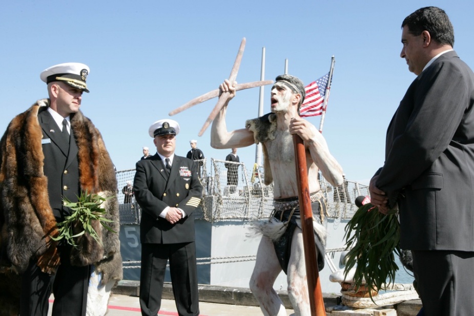 CMDR John Banigan, CO USS John S McCain and his ship's company are welcomed to Melbourne by traditional land owners, the Boon Wurrung people. John Tye welcomed the Great White Fleet 100th year anniversary to Port Melbourne, with traditional dance, singing and digeridoo playing accompanied by one of the elders, John Belling. The CO of USS John S McCain Commander John Banigan had a possum fur placed over his shoulders as a sign of mutual respect from the Boon Wurrung people.