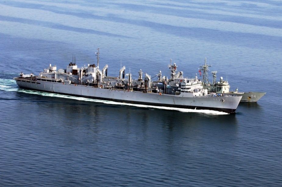 An aerial view of HMAS Darwin and USS Rainier during a replenishment at sea while on station, 9 February 2003.