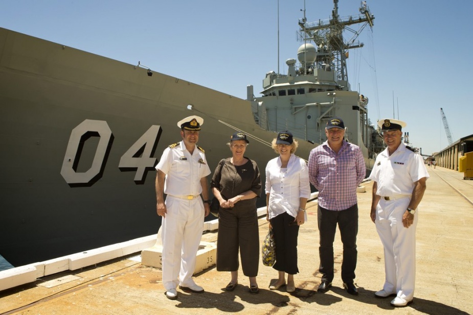 CO HMAS Darwin, CMDR Terence Morrison, RAN, HMAS Darwin's Launching Lady, Mrs Joan Johnston, OAM, Mrs Karen Hall, Jon Hall and Warrant Officer Peter Leech, with HMAS Darwin in the background at the Port of Fremantle, Western Australia, 28 January 2014.