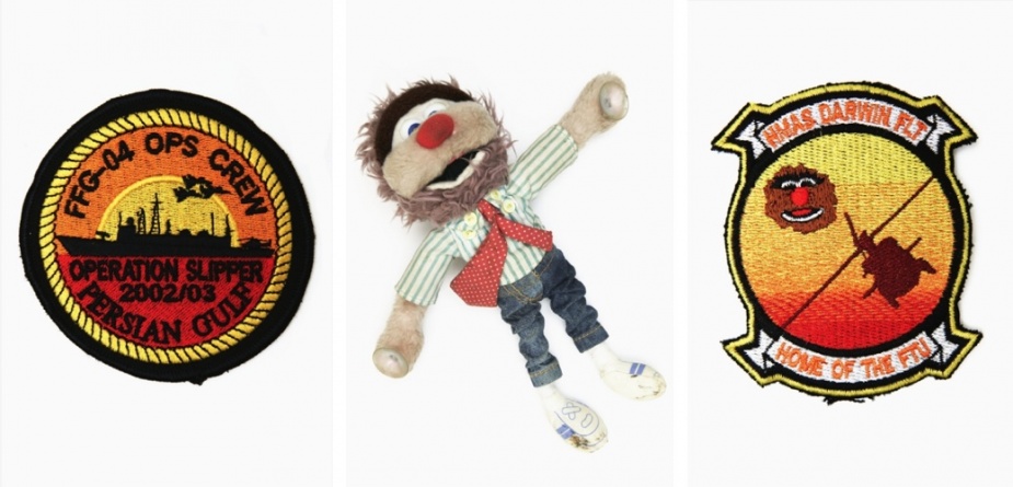Left: Patch worn by members of the Operations Room Crew aboard Darwin during the war on Iraq, 2003. Middle: Mascot of Australian children’s television character ‘Agro’ carried by the embarked Sikorsky S-70B Seahawks helicopter aboard Darwin during the war on Iraq 2003. The mascot, along with a Fosters beer mat, were displayed on the dash of the helicopter, to ensure that no confusion existed as to the nationality of the crew. The Seahawk itself was known among Coalition units as ‘Agro’.