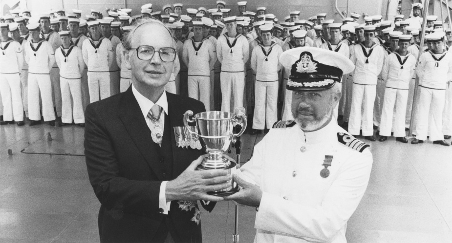 The Governor-General of Australia Sir Ninian Stephen presents Captain MS Unwin, RAN with the Duke of Gloucester Cup onboard HMAS Stalwart in 1983