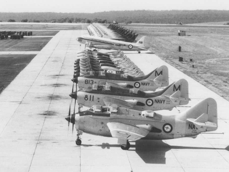 On the ground at NAS Nowra from front to back: Gannets, Sea Venoms, Sea Vampires, a Dakota and Wessex helicopters.