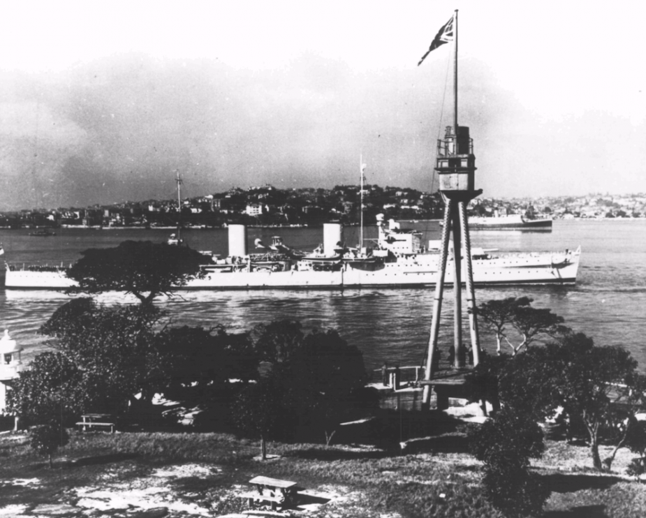 Sydney passing the foremast of her namesake, HMAS Sydney (I), on arriving in Sydney.