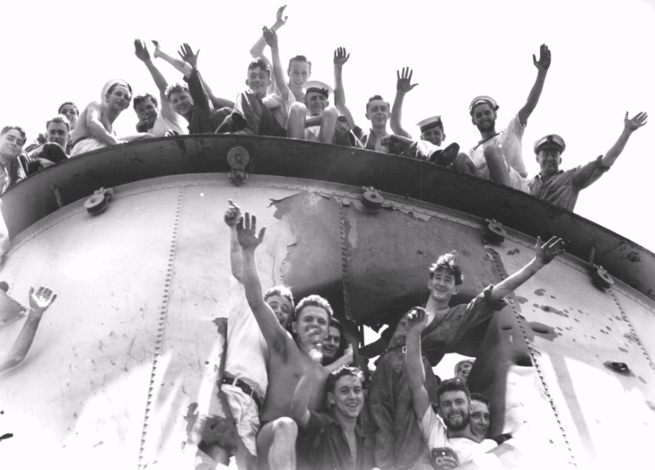 Members of Sydney's crew pose triumphantly in Alexandria.