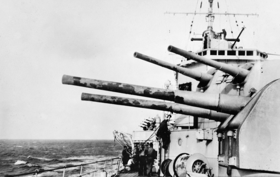 During the Cape Spada action Sydney fired 956 rounds of 6-inch shell at the enemy. Note the blistered paint visible on her gun barrels.
