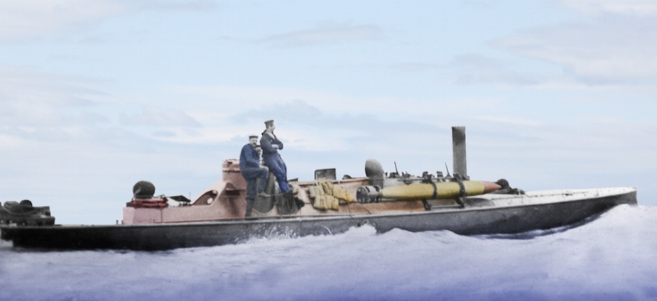 HMVS Lonsdale underway on Port Phillip Bay. Note the Whitehead torpedo secured in the torpedo dropping gear.