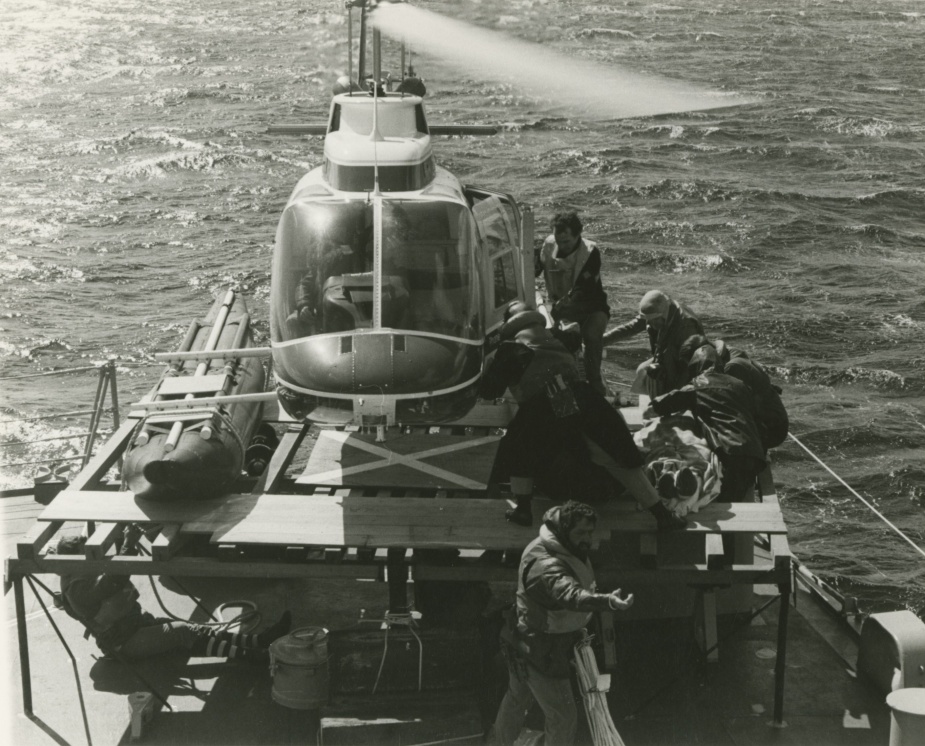 Thala Dan's helicopter on the makeshift helipad onboard HMAS Hobart.