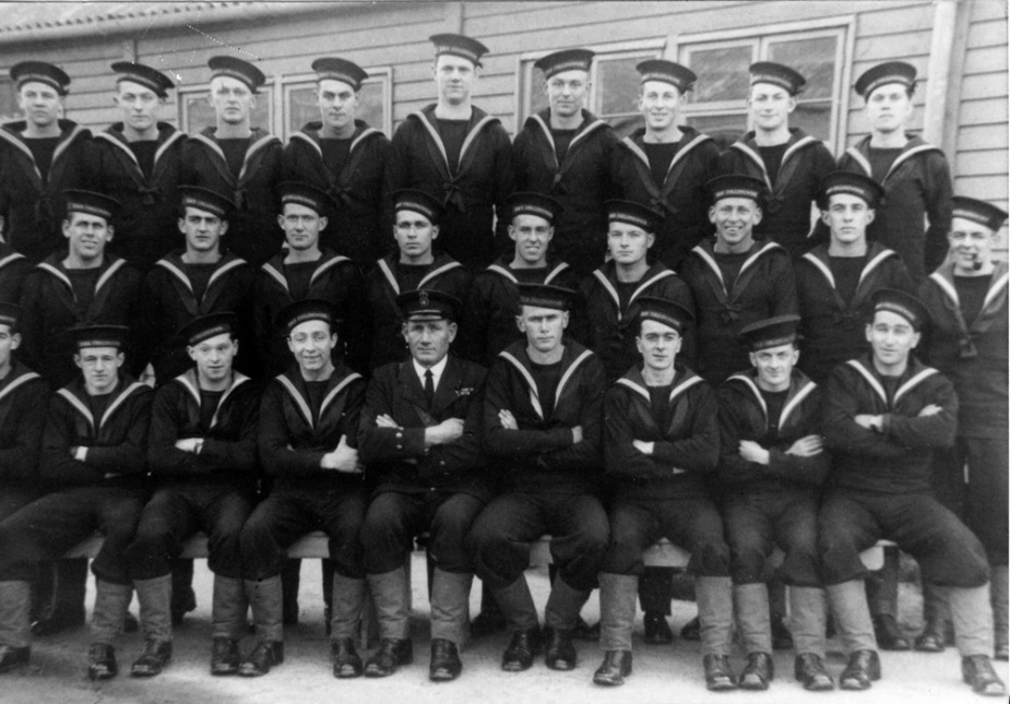 Ordinary Seaman John Shannon (Far left, top row) with fellow class members, HMS Collingwood Dec 1940. Image courtesy of Geoffrey Thomas.