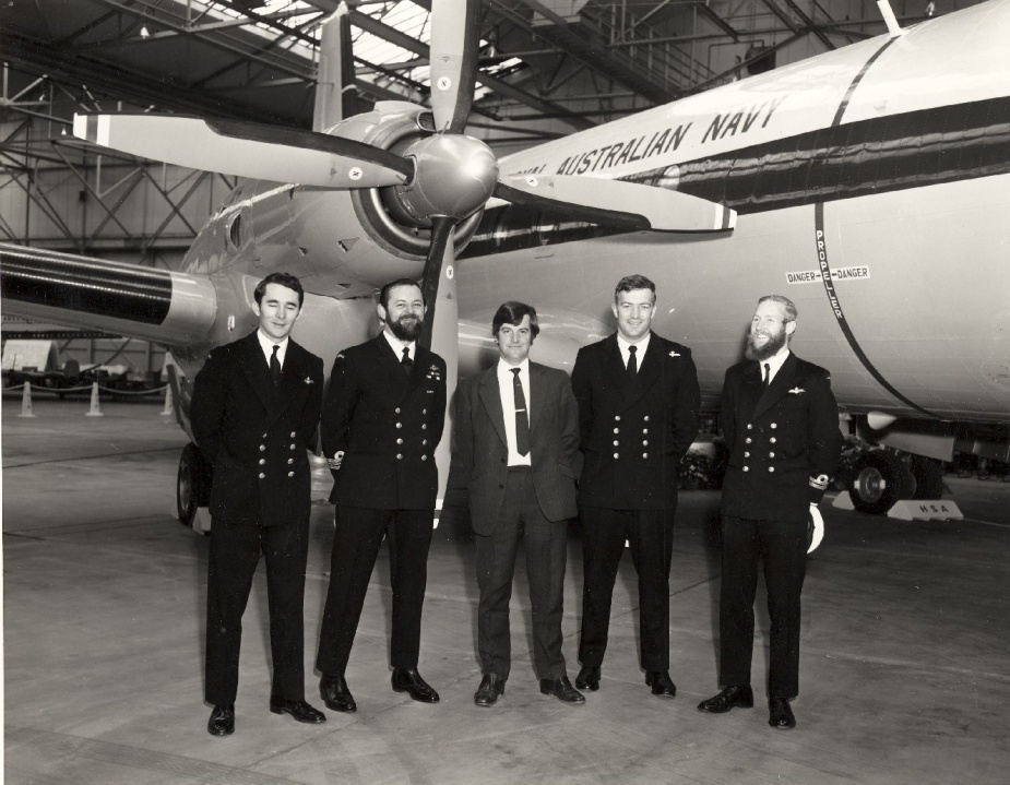 The crew of the first RAN trans-global HS748 flight; LEUT Jack McCaffrie, LCDR Winston James, LEUT Bob Salmon and LEUT Owen Nicholls flank a representative from Hawker Siddeley.