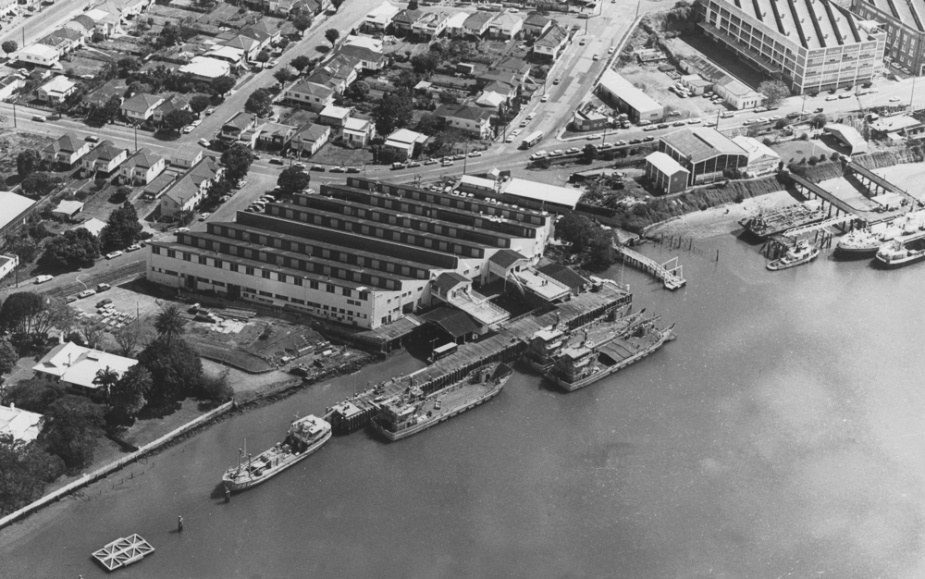 An aerial view of Moreton with several of the RAN's LCHs secured alongside.