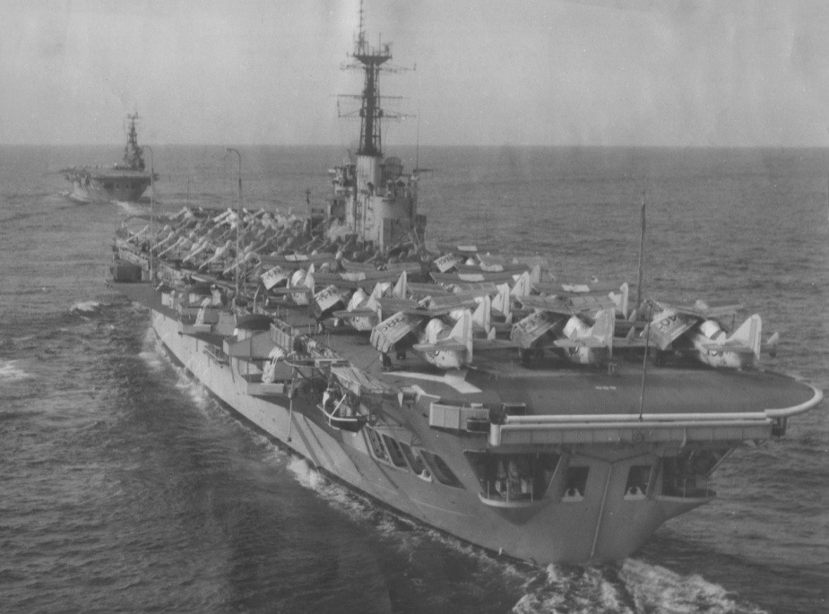 HMAS Melbourne off the east coast of Australia on 6 May 1956, astern of HMAS Sydney, following her delivery voyage from Britain.