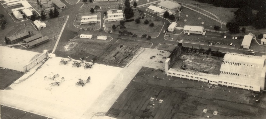 NAS Nowra after the hangar fire of 4 December 1976 that all but wiped out the RAN Tracker fleet. The roof over the southern end of the hangar collapsed destroying all the aircraft beneath it.