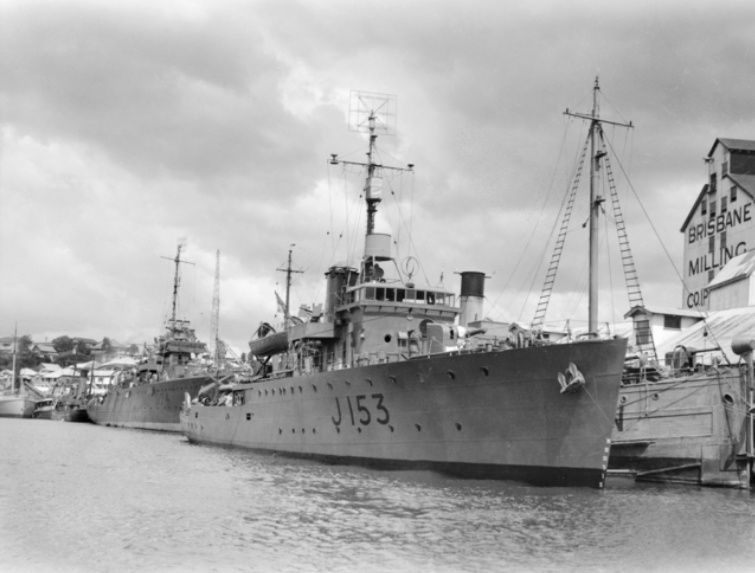 Starboard bow view of Whyalla in Brisbane, Queensland, circa 1944. Behind her is the sloop HMAS Swan. Note a SC radar is fitted to the masthead and a type 272 radar lantern is mounted above and behind the bridge.