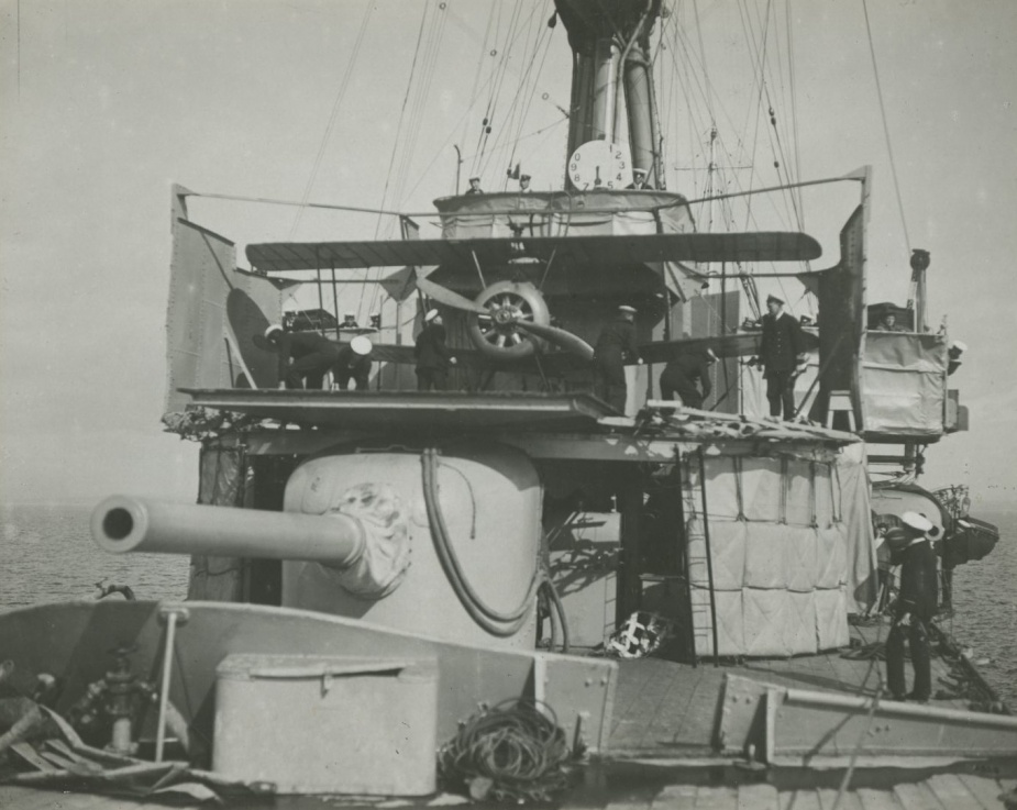 Sydney's aircraft mounted on the revolving catapult situated in front of her bridge