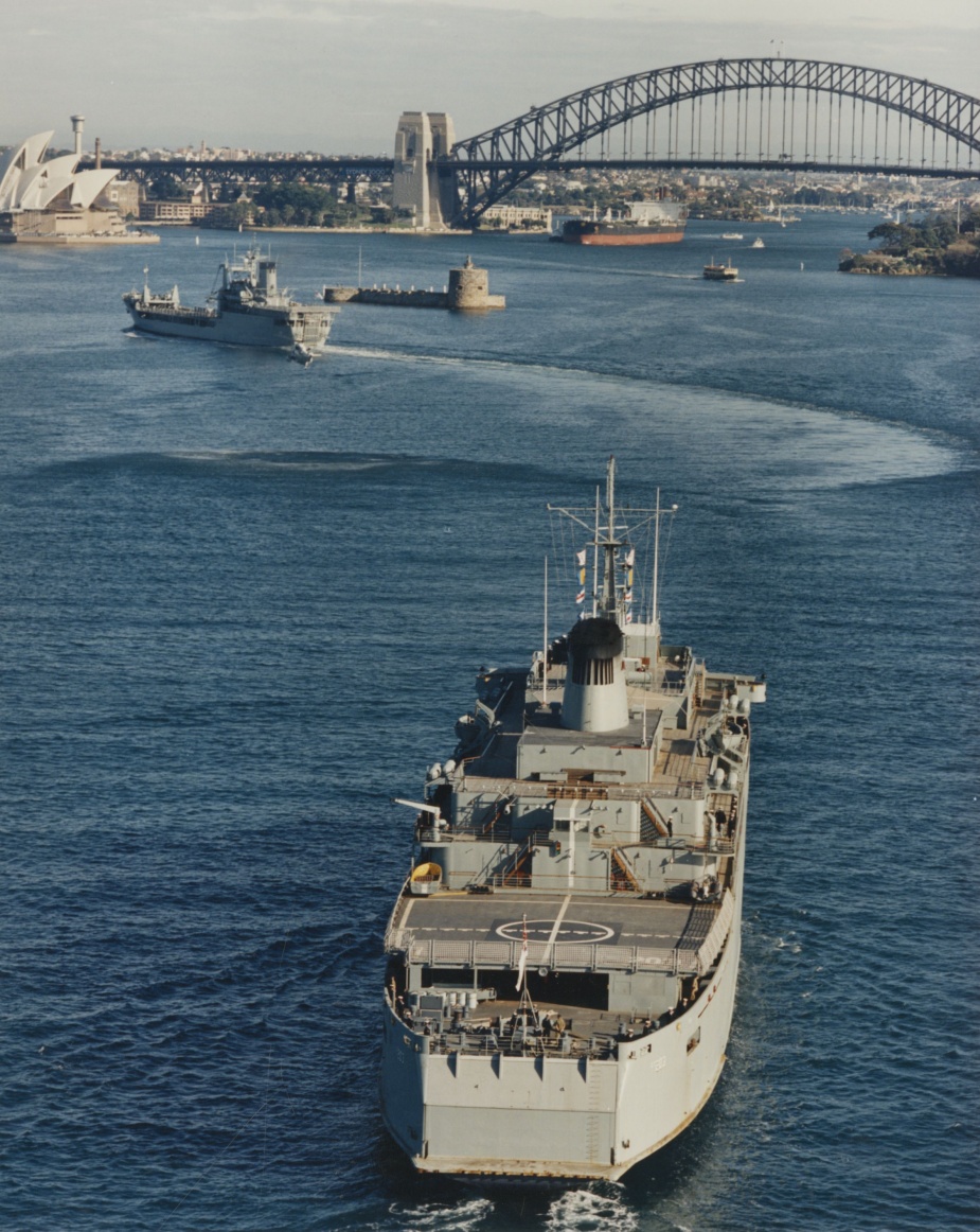 Tobruk leads Jervis Bay into Sydney following their withdrawal from Operation SOLACE.