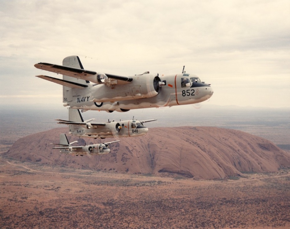851 Squadron Trackers in flight over Uluru.