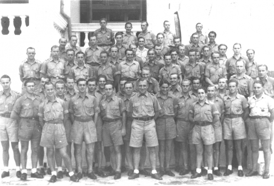 Korvettenkapitän Heinrich Timm, with his crew following their arrival in the Far East.