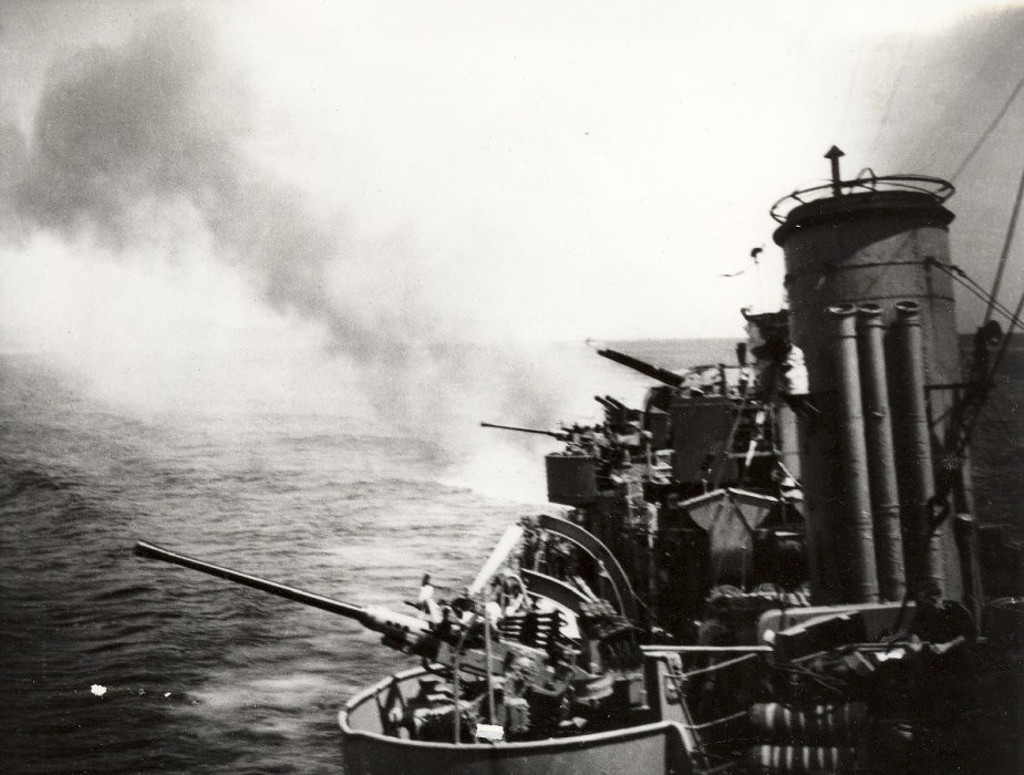 HMAS Warramunga conducts a shore bombardment (RAN).