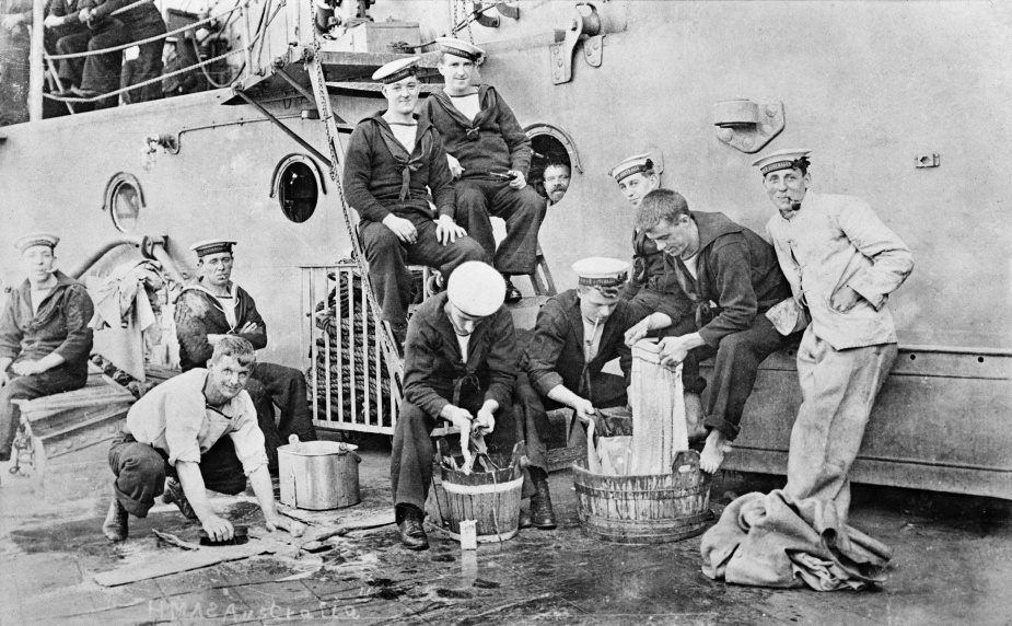 Australia ratings take time out to wash (dhobey) articles of kit on the upper deck.