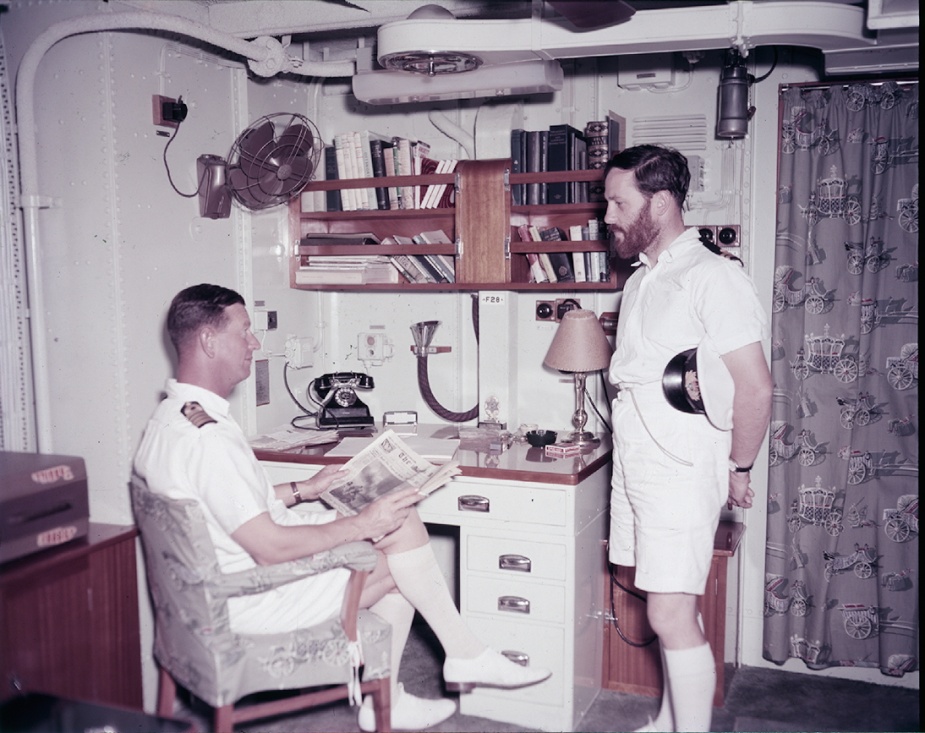 Captain RJ Robertson, DSC, RAN in his day cabin, circa 1958.