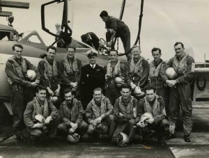 808 Squadron in 1955 posing before a Sea Venom. Back row, left to right; LEUTs Peter Wyatt and David Hilliard, LCDRs Peter Seed and George Jude, LEUTs Barry Thompson, Alan Cordell, Edward Wilson and Geoffrey Gratwick. Front row, left to right; LEUTs Ronald McIver, Stanley Carmichael, Keith Potts, Neil Ralph and Bernard Brennan. Thompson and Potts were both killed when their Sea Venom crashed into the sea in 1956. Stanley Carmichael also lost his life in similar circumstances in 1959.