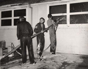 Sailors fighting the hangar fire at HMAS Albatross on the night of 4 December 1976.