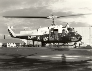 An Iroquois takes off from HMAS Albatross for the last time on 31 May 1989, piloted by Lieutenant Keith Champion and Albatross Commanding Officer, Commodore Matt Taylor, sitting right seat.