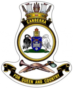 The official badge of HMAS Canberra featuring the coat of arms of the city of Canberra.