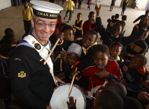 Able Seaman Damian Dowd with Students from Ukhanyo School in Masephumelele in South Africa.