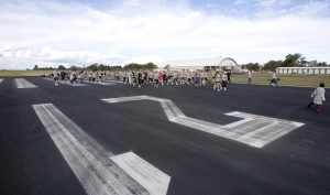 The 2012 ‘Tour the T’ fun run. Shoalhaven residents have the rare opportunity to get out on Albatross’ t-shaped flight deck.