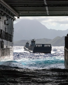 Two of HMAS Canberra's landing craft prepare to enter the ship's well dock off the east coast of Oahu, Hawaii during Exercise Rim of the Pacific (RIMPAC) 2016.