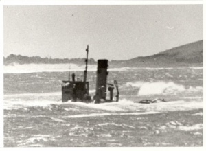 HMAS Waree stuck fast on the Yamba sand bar.