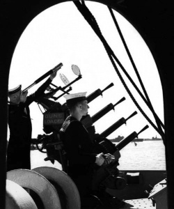 Signalmen 'Slim' Roper and Joe Harris keeping a visual lookout in Alexandria Harbour, Egypt, 1941.